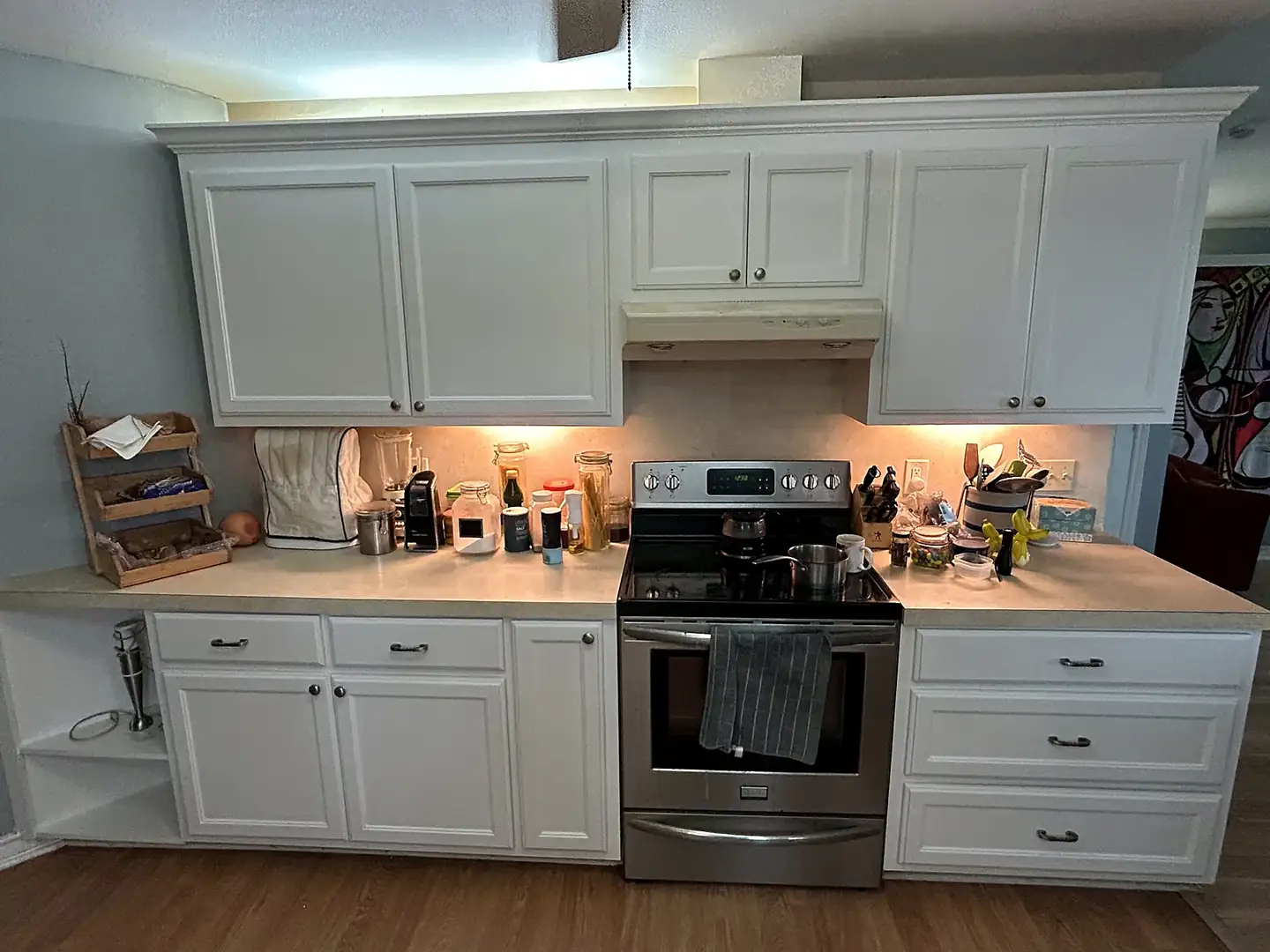 Kitchen cabinets and trim painted bright white