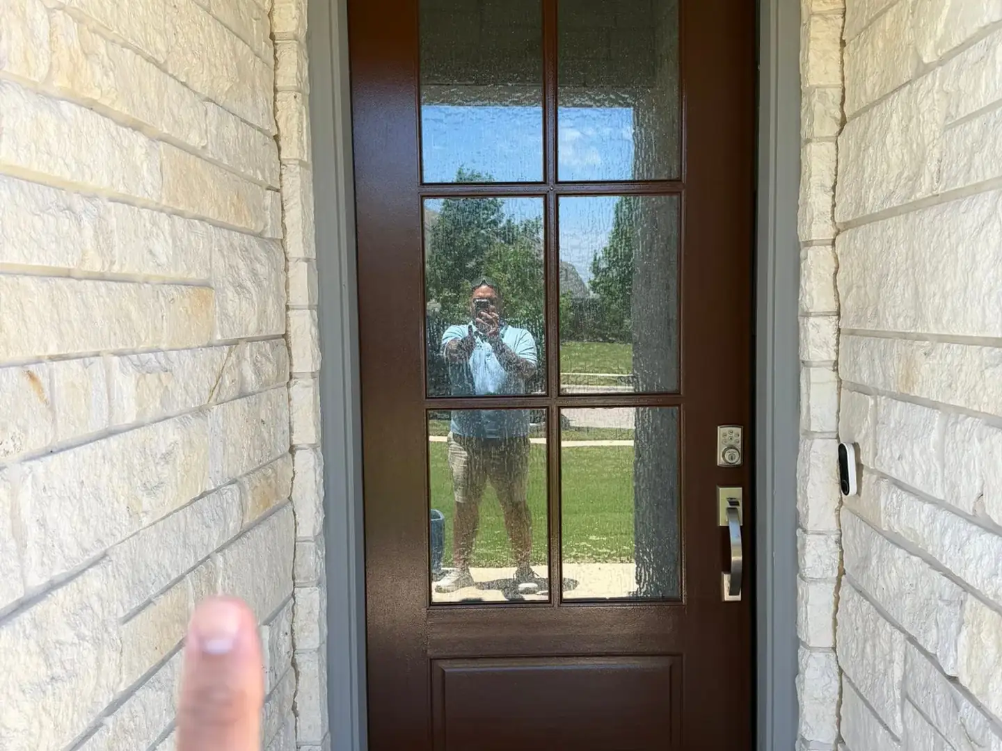 Front entry door and trim freshly painted on a Central Texas home