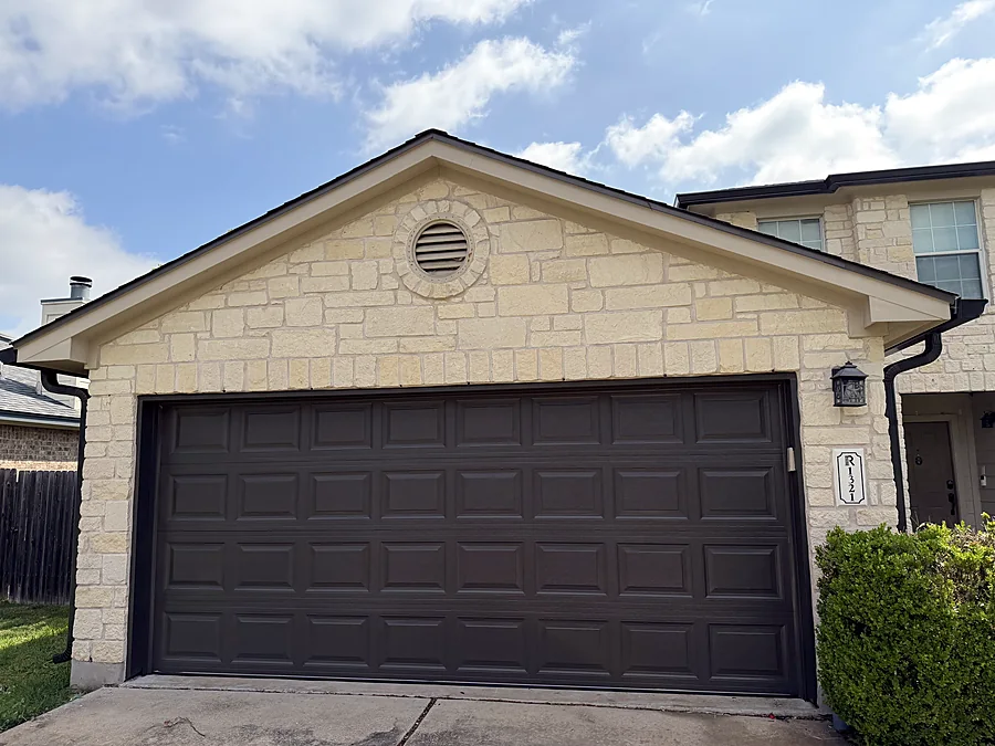 Garage door painted charcoal by V&S Painting in Austin