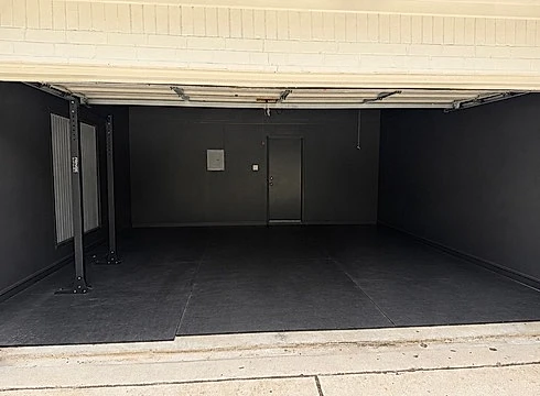 Same garage after, walls and floor finished in charcoal by V&S Painting
