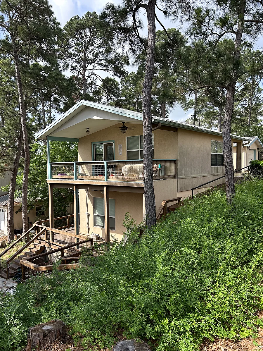 Hillside Austin home before exterior refresh, weathered