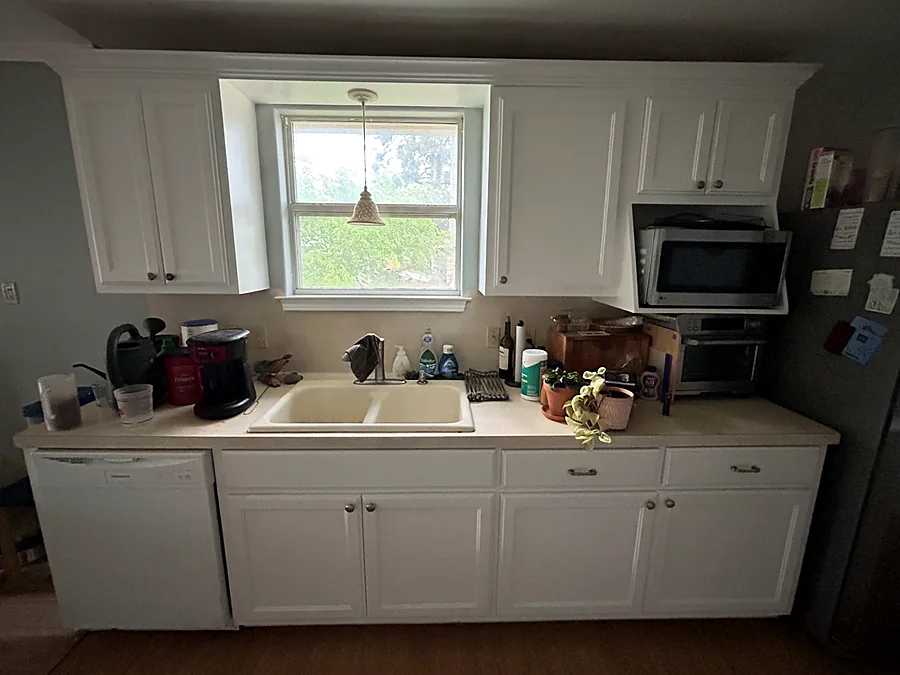 Kitchen cabinets refinished white by V&S Painting in Austin