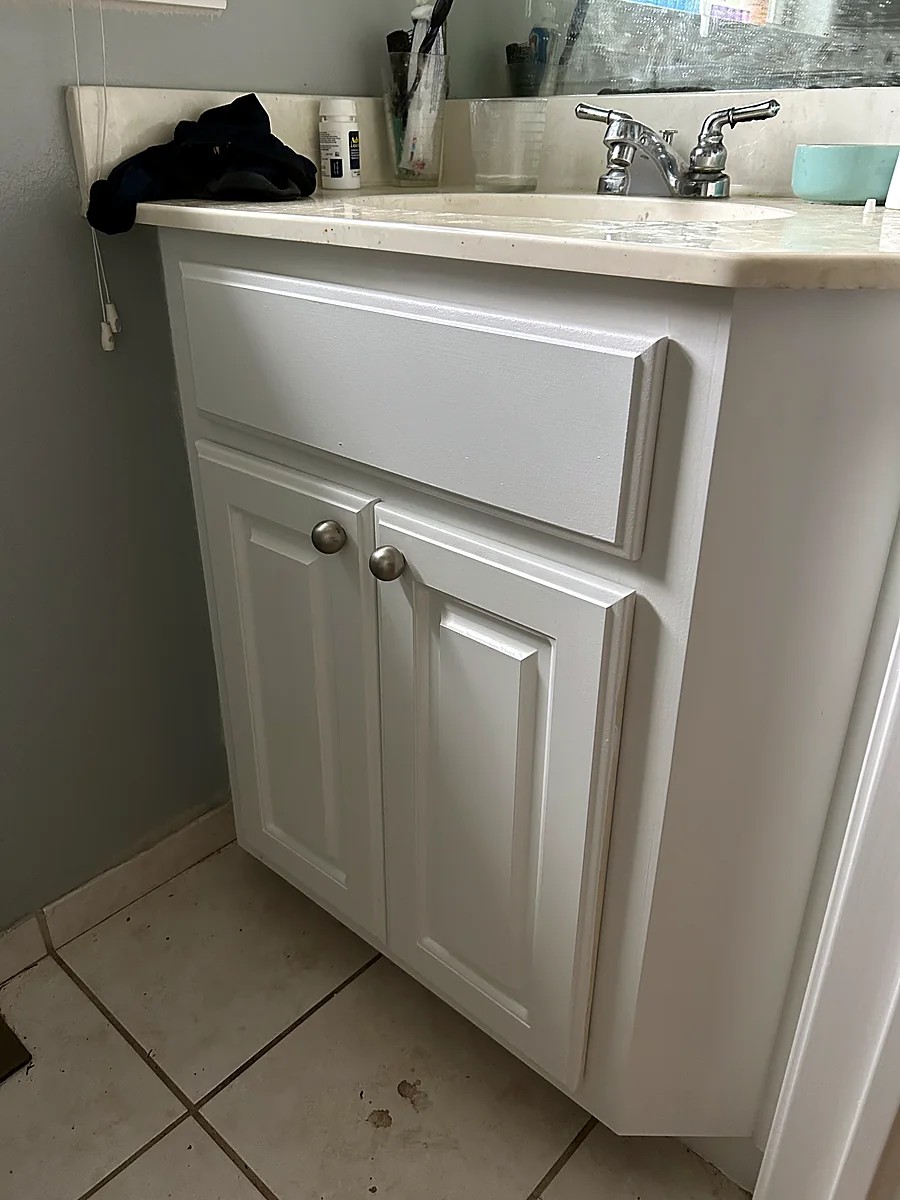 Bathroom vanity refinished white by V&S Painting in Austin